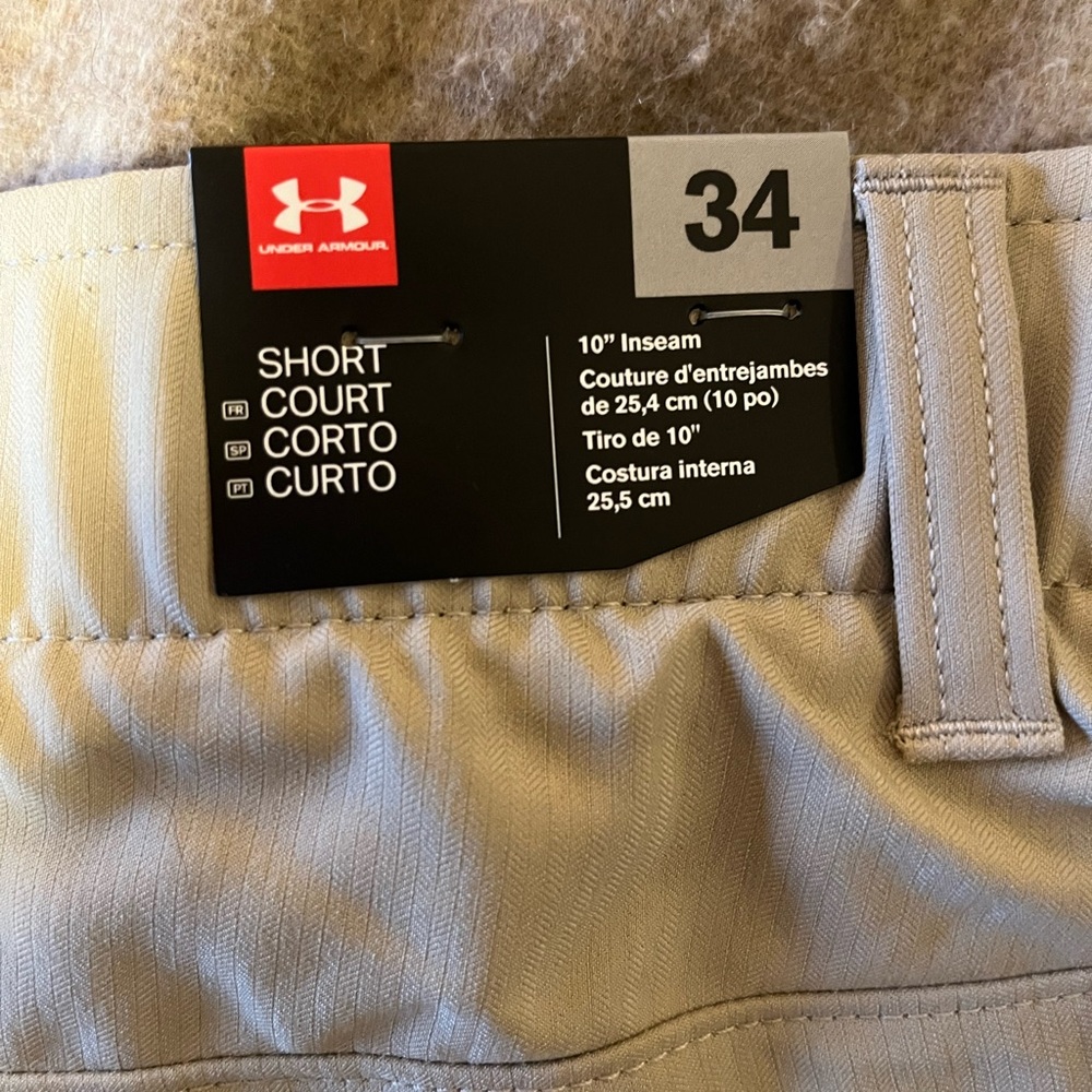 2 pairs of new Under Armour shorts. Gray and khaki